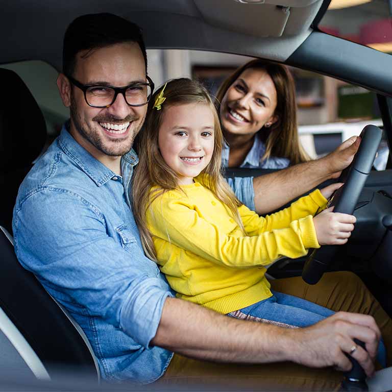 Daughter On Dads Lap In Car